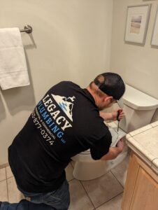 A plumber wearing a 