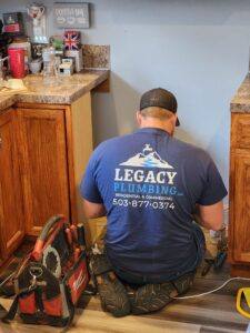 A plumber wearing a 